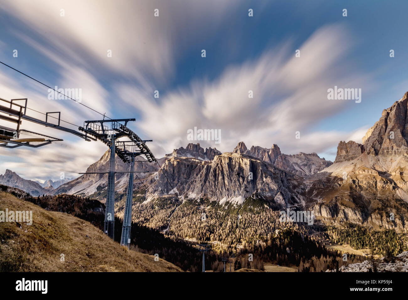 Upper station of the cable car, in the background Dolomites and clouds in motion. Dolomites Alps, Italy, Stock Photo