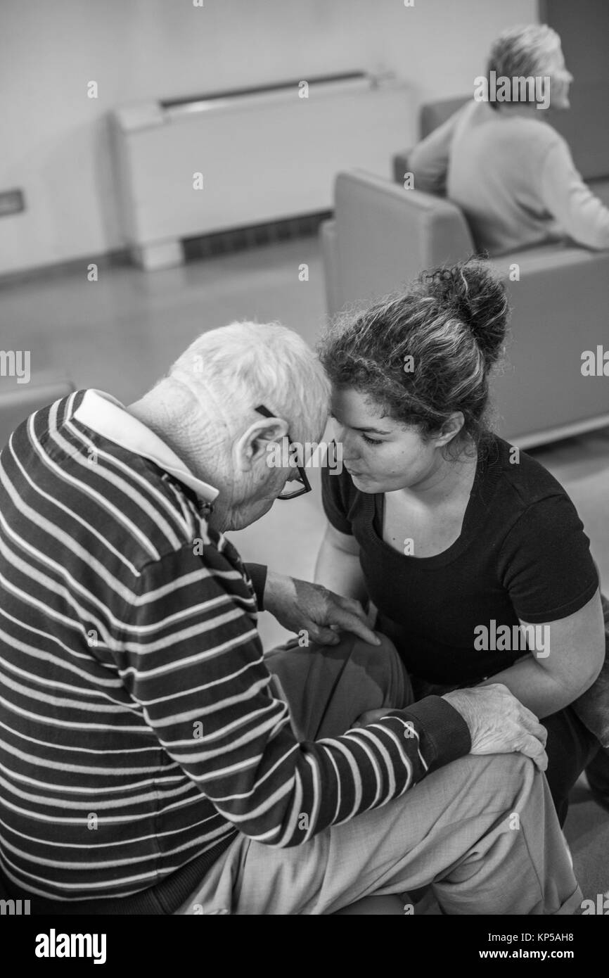 EHPAD specialized in the care of the elderly suffering from Alzheimer's disease, Dialog between a caregiver and residents, Center for Psychogeriatric  Stock Photo