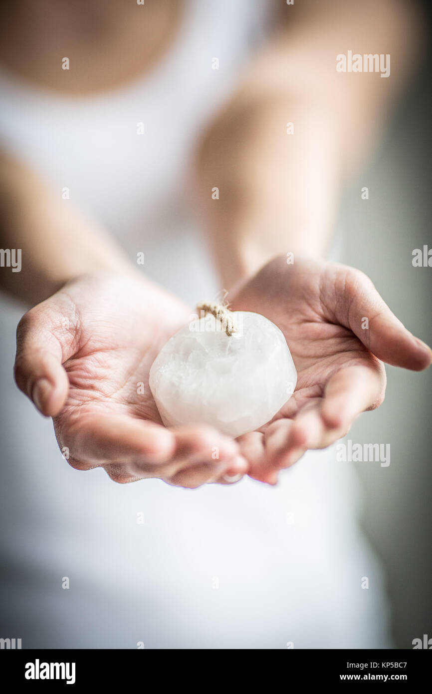Woman using alumstone as deodorant Stock Photo Alamy