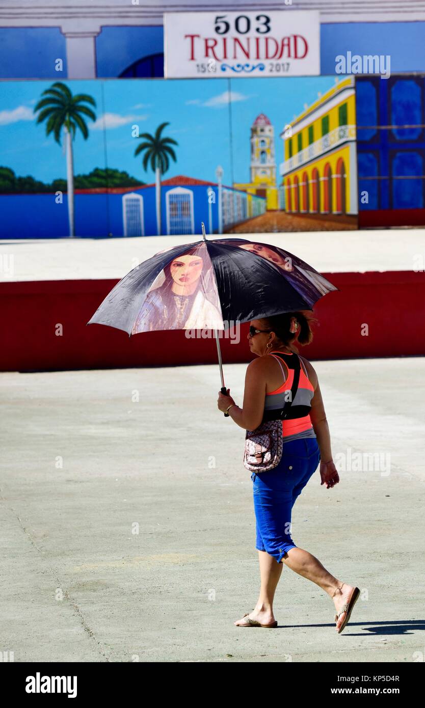 Sun parasol woman walking hi-res stock photography and images - Alamy