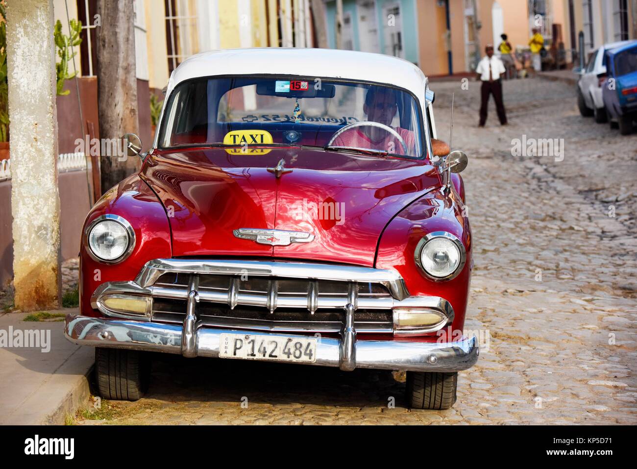 Red 1950's Chevrolet used as a taxi in Trinidad,Cuba. Stock Photo