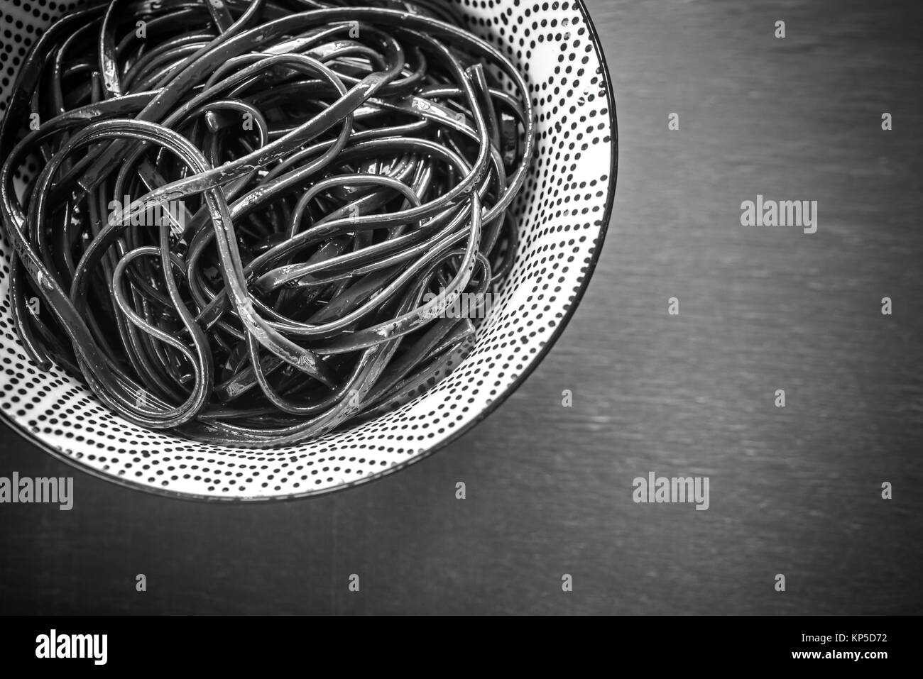 Bowl of black pasta Stock Photo Alamy