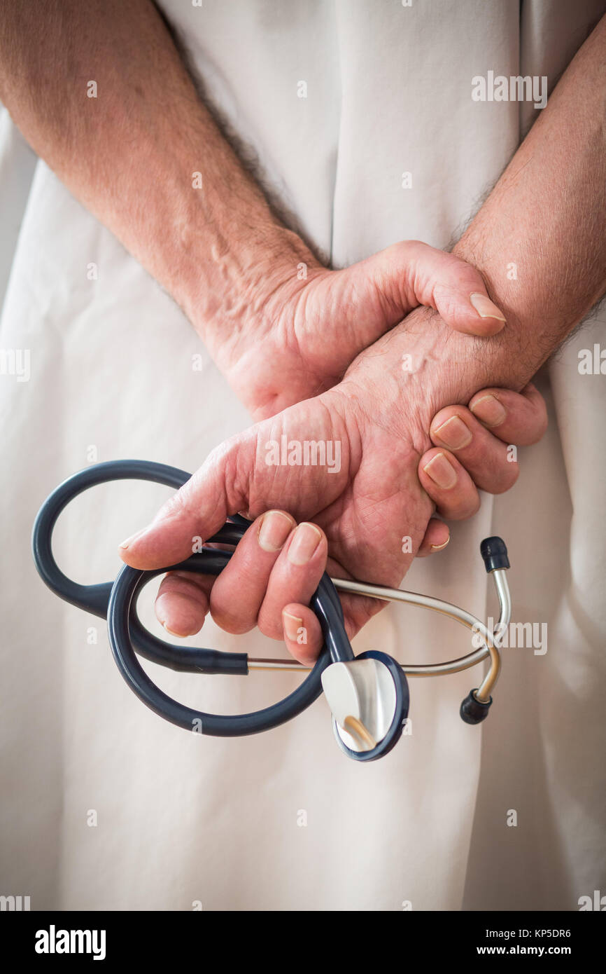 Doctor holding a stethoscope hi-res stock photography and images - Alamy