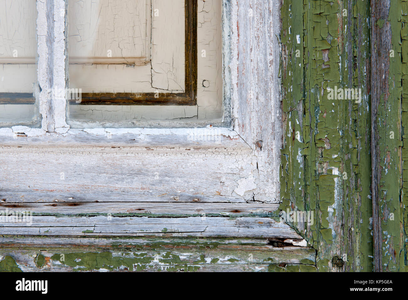 Flaking paintwork on a old and historic window. Stock Photo