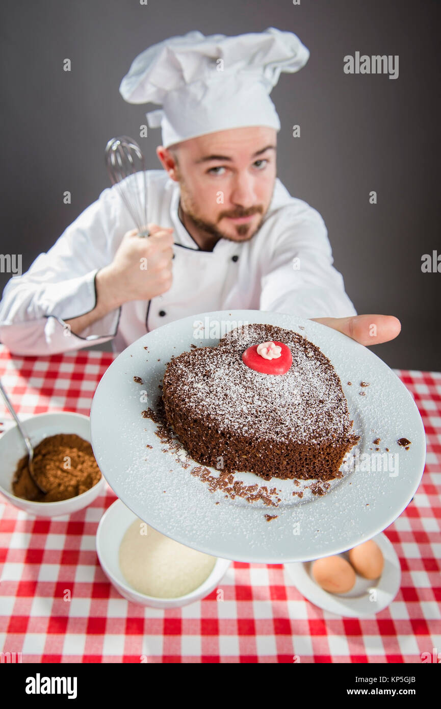 Kuchenbaecker - cake baker Stock Photo