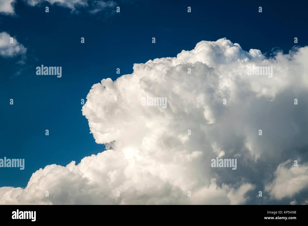 Blue sky with puffy white clouds in bright clear sunny day Stock Photo ...