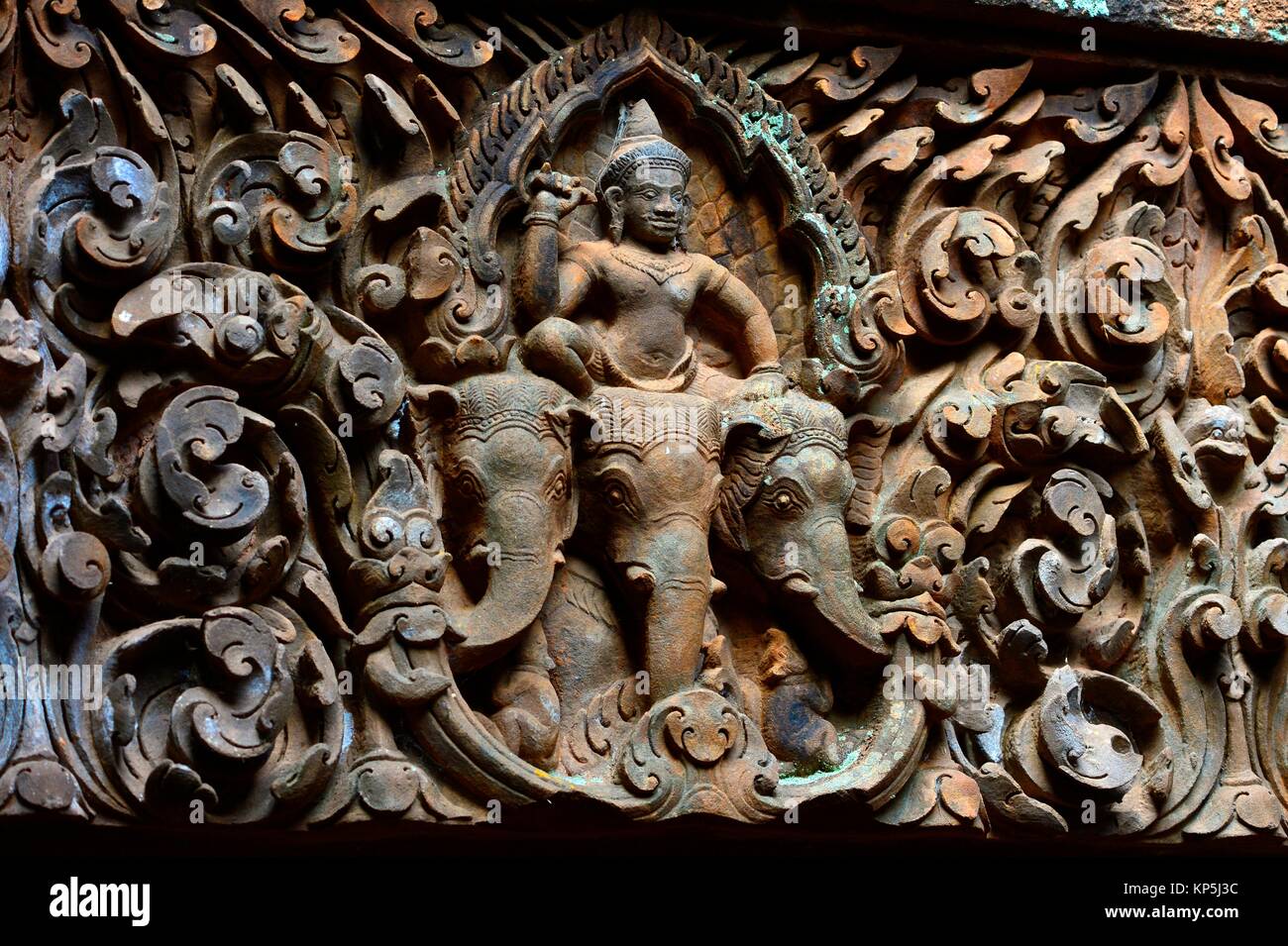 Elaborate carved stone lintel on a ruined temple at Wat Phou,South Laos,Southeast Asia. Stock Photo