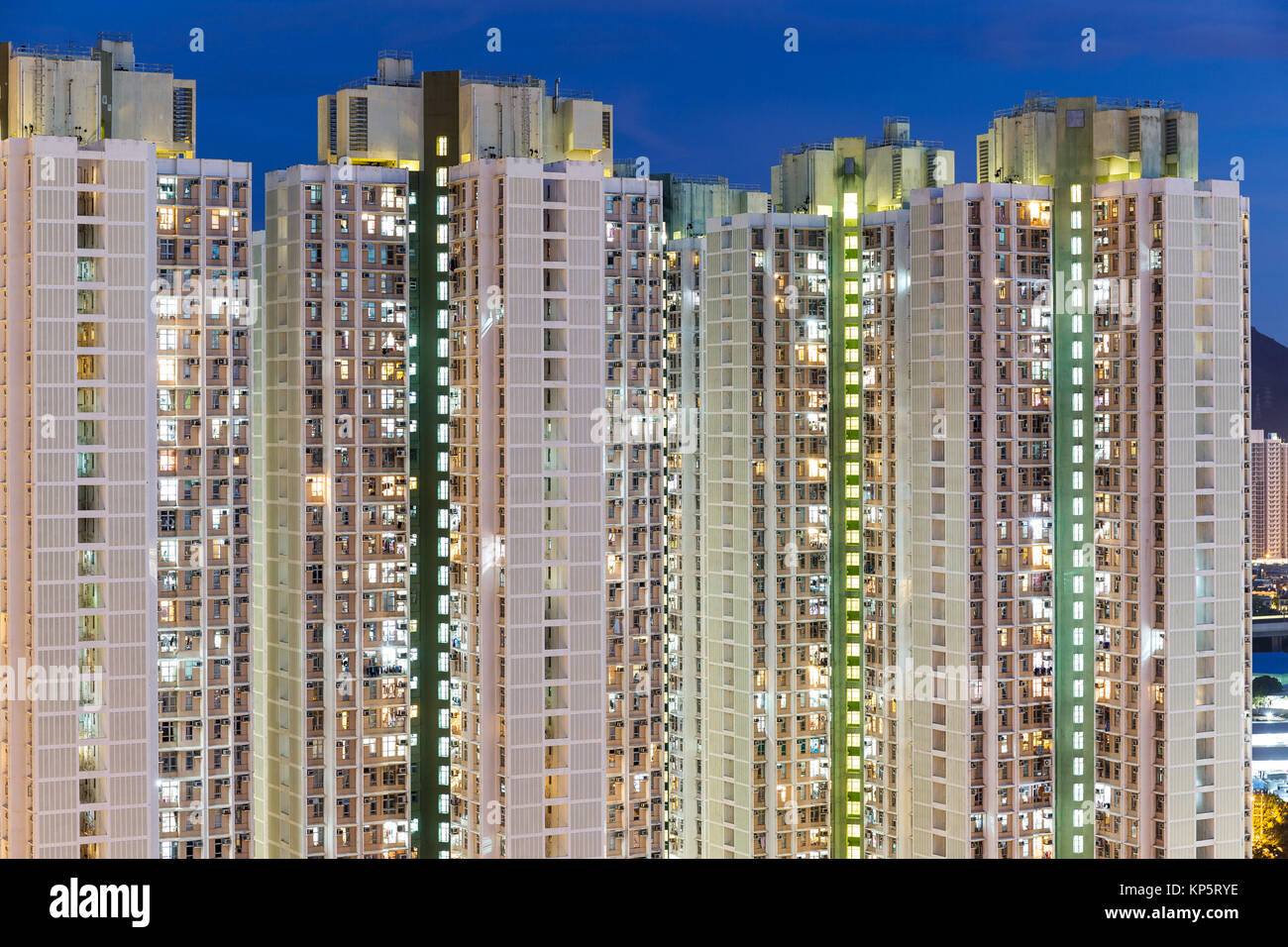 Apartment building in Hong Kong at night Stock Photo - Alamy