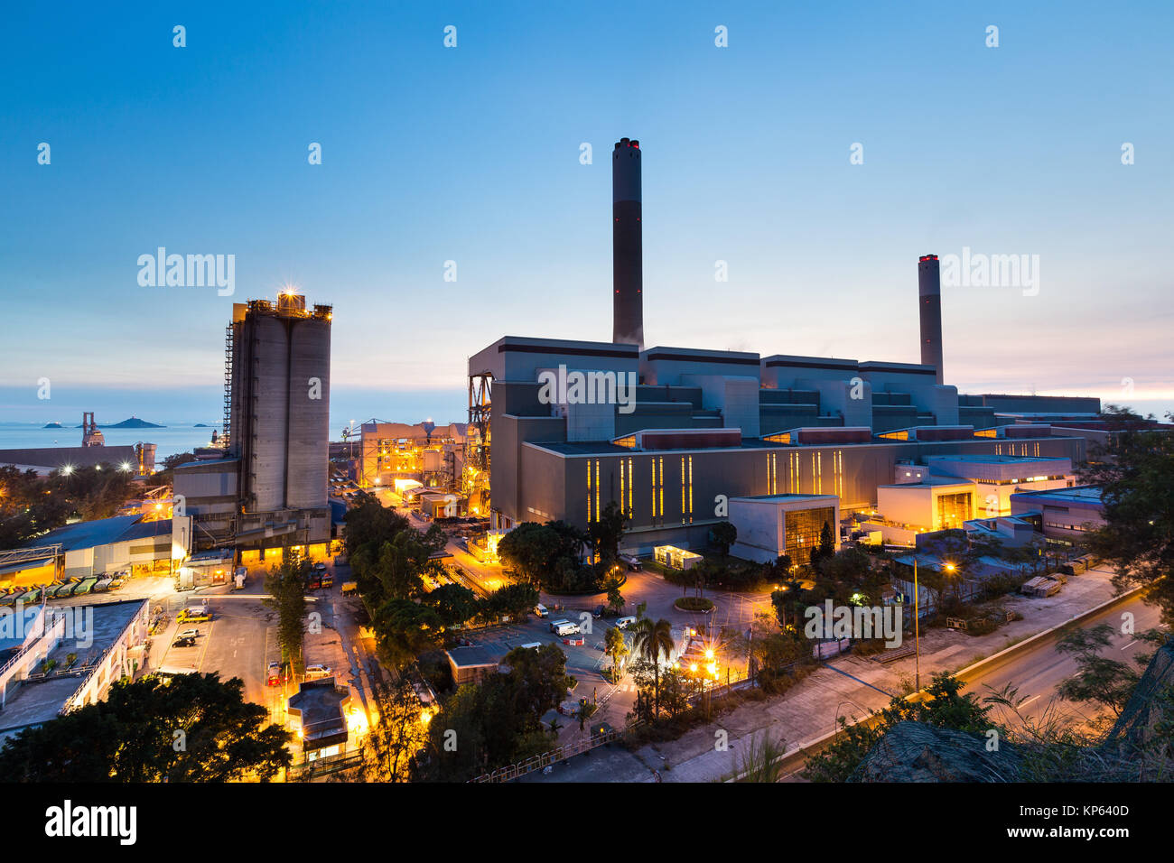 Glow light of petrochemical industry during sunset Stock Photo