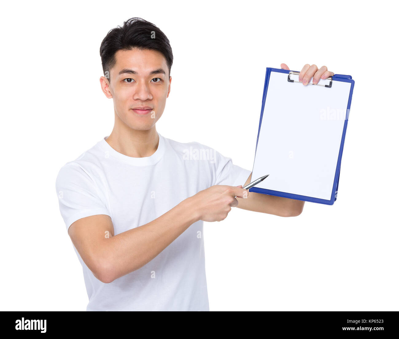 Asian young man pen point to white paper of clipboard Stock Photo - Alamy