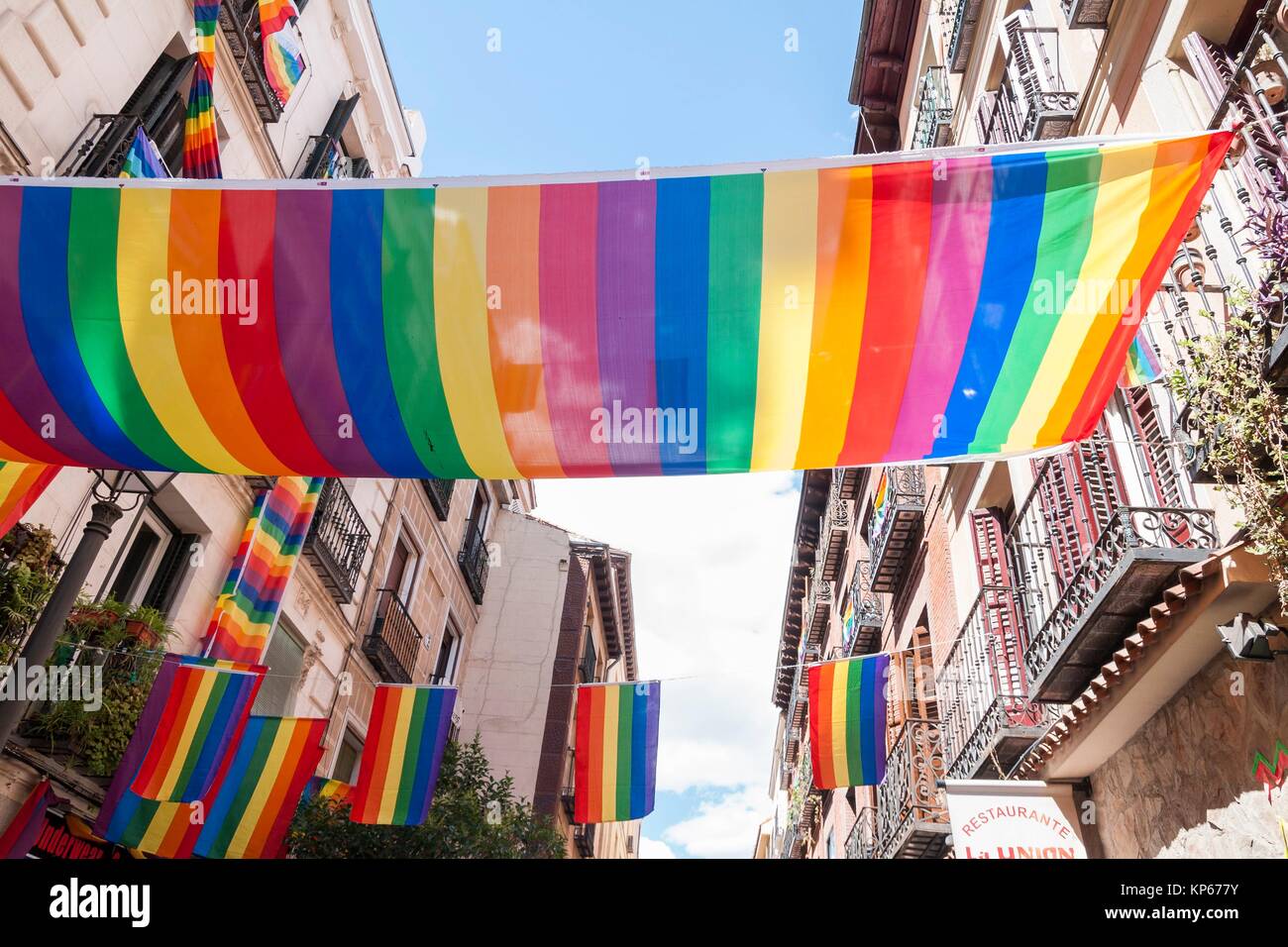 Rainbow flags fly from official buildings in Madrid and Valencia, Spain