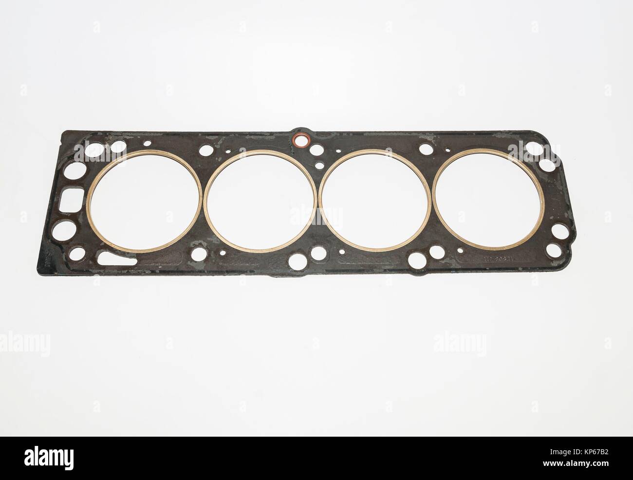 Head gasket, part of automotive engine Stock Photo Alamy