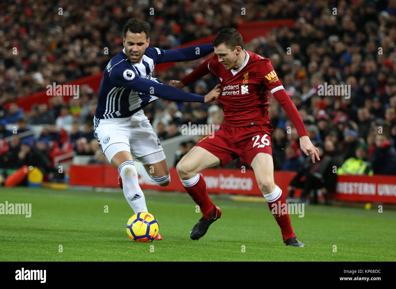 West Bromwich Albion S Hal Robson Kanu And Liverpool S Andrew Robertson Battle For The Ball During The Premier League Match At Anfield Liverpool Stock Photo Alamy