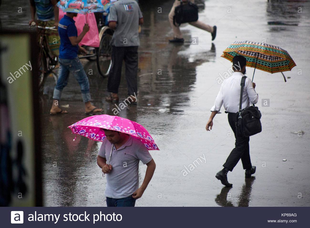 Using Umbrella Stock Photos & Using Umbrella Stock Images Alamy