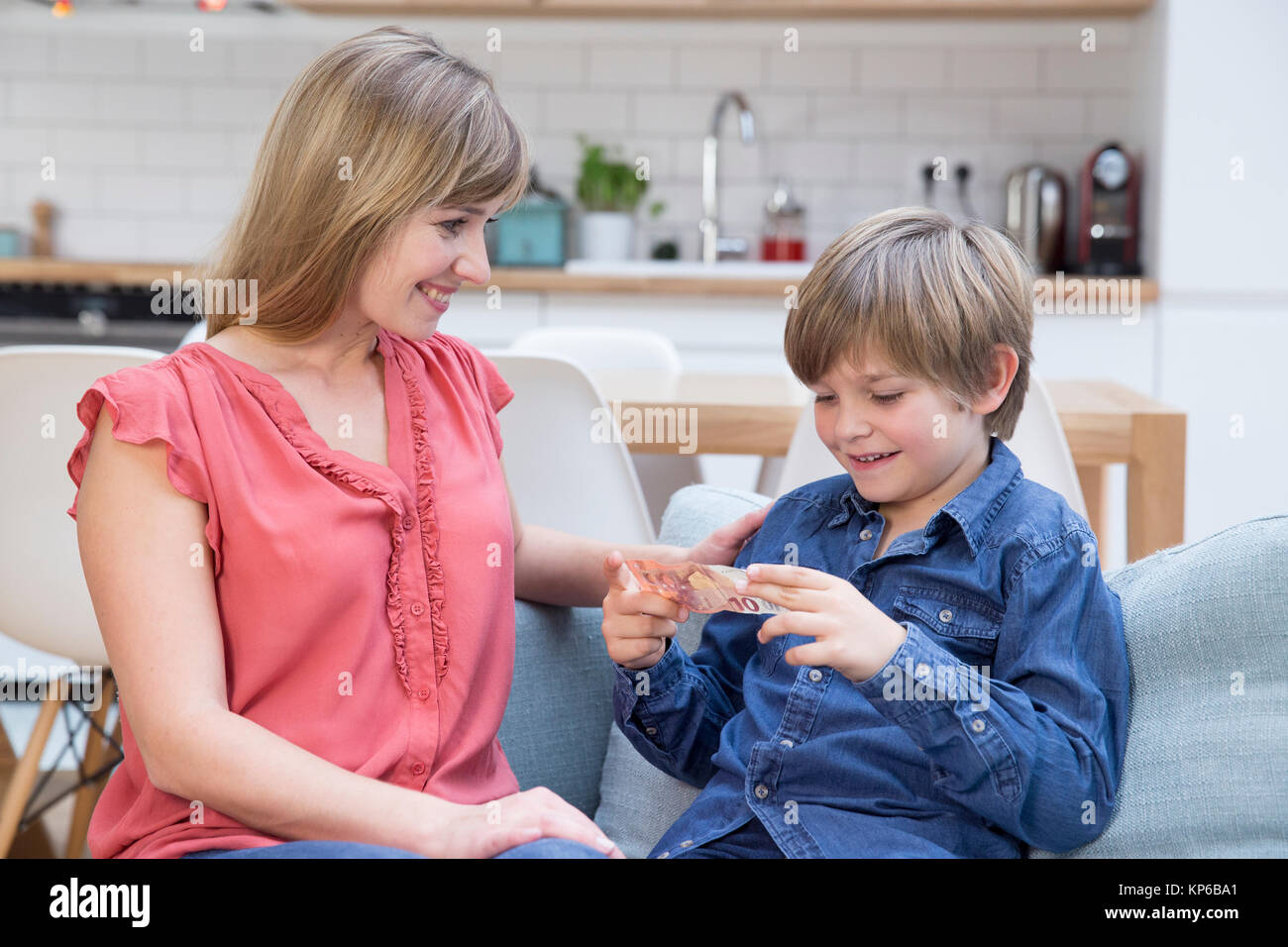 Child Getting Money CHILD WITH MONEY Stock Photo - Alamy