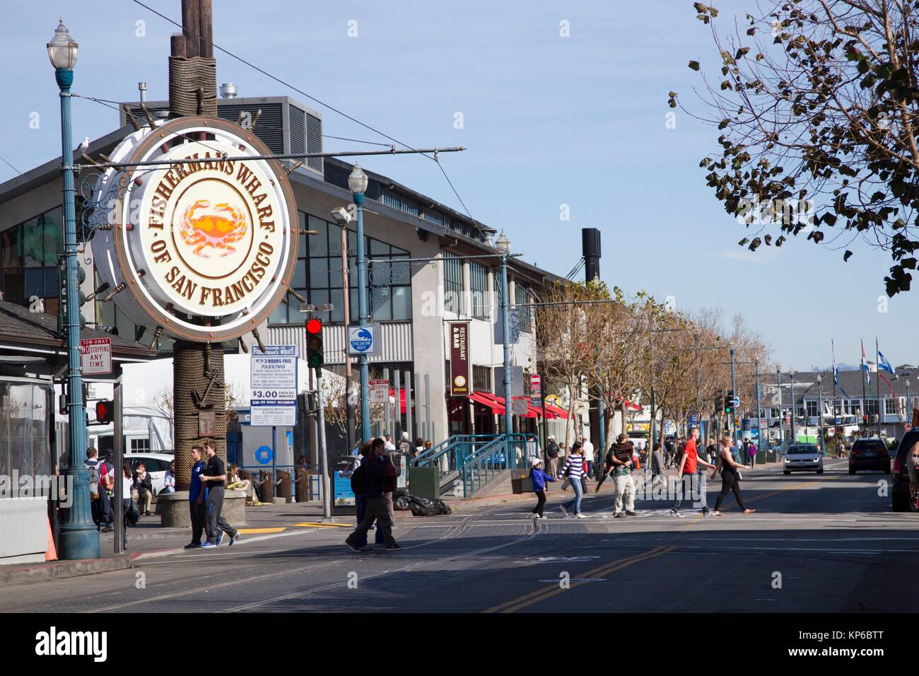 People stroll at Fishermans’s Wharf in San Francisco, California