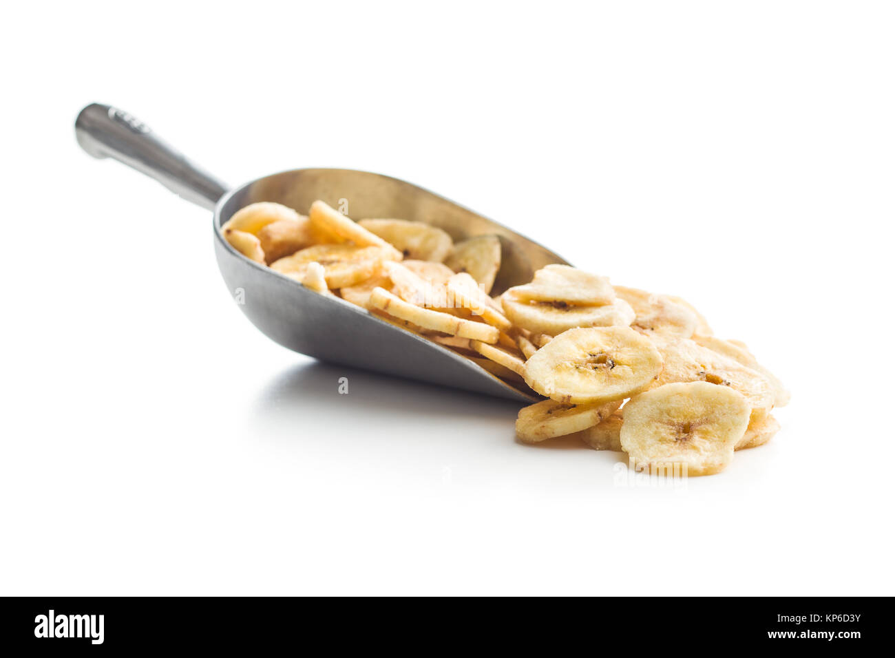 Dried banana chips in scoop isolated on white background Stock Photo