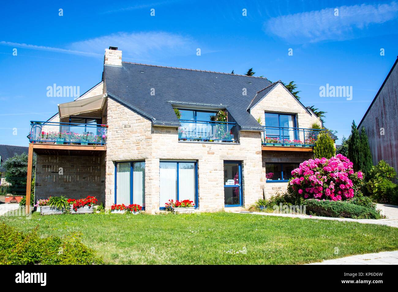 Typical blue brittany house made of stone and landscape and