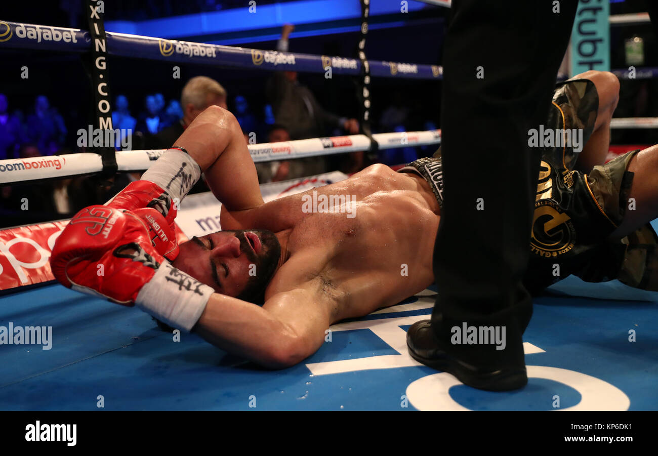 Juli Giner after being knocked down by Martin J Ward in the EBU  Super-Featherweight contest at York Hall, London Stock Photo - Alamy
