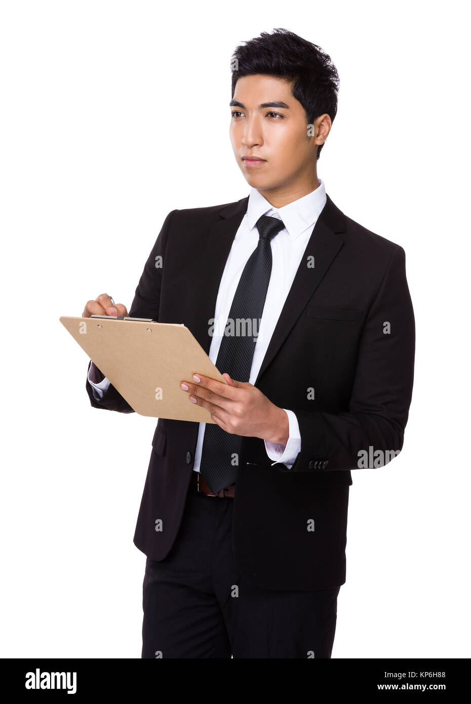 Businessman write on clipboard Stock Photo - Alamy