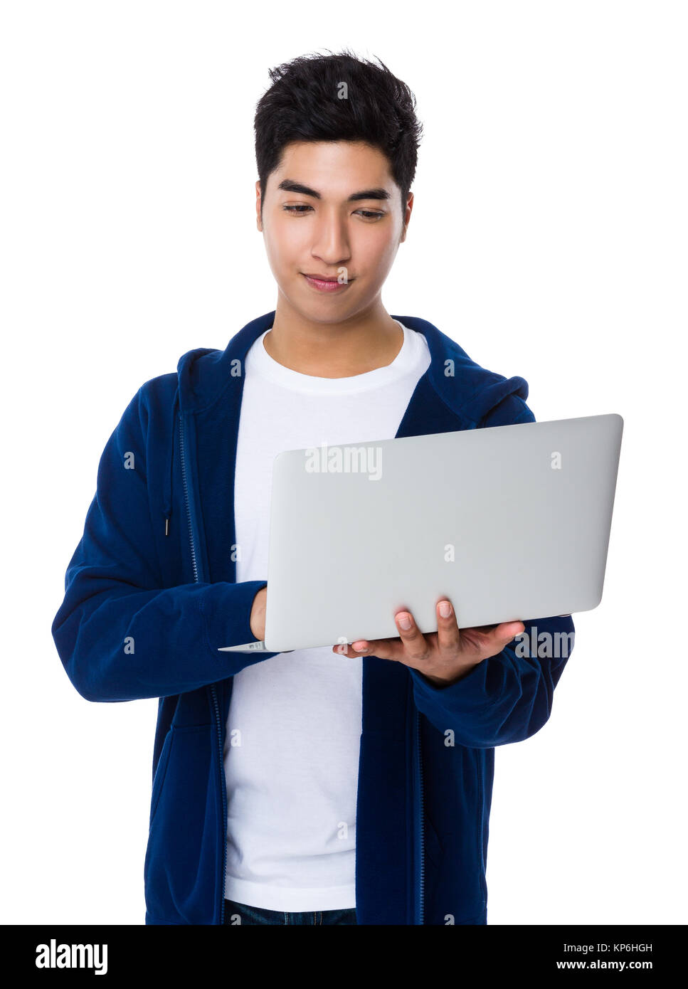 Asian man use of the notebook computer Stock Photo - Alamy