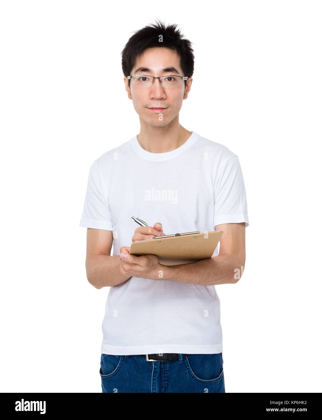 Asian man take note on clipboard Stock Photo - Alamy