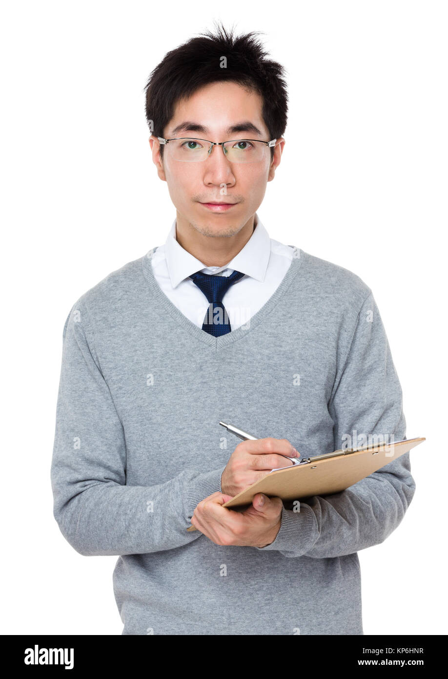 Business man take note on clipboard Stock Photo - Alamy