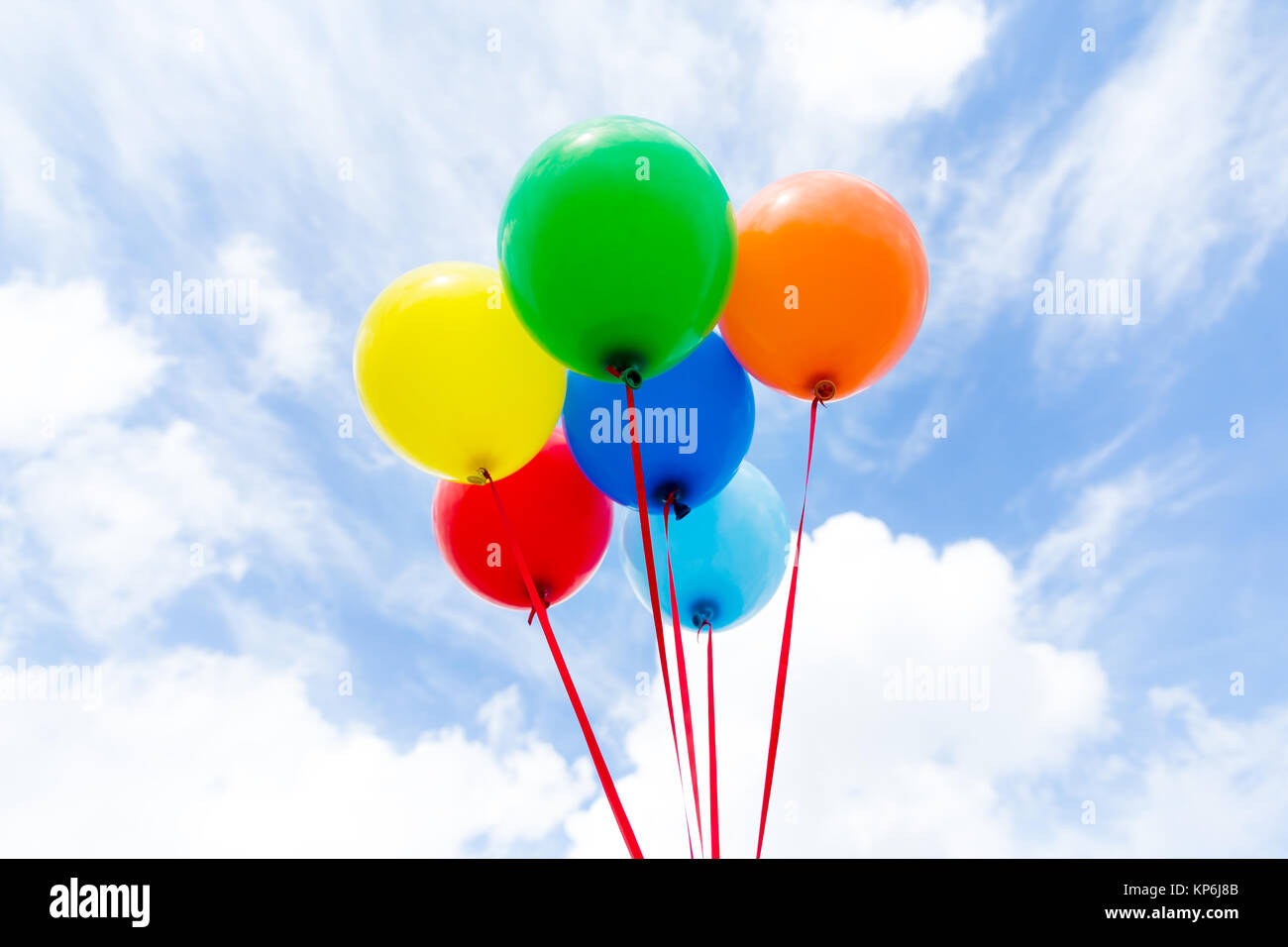 A group of colorful balloons with blue sky background Stock Photo