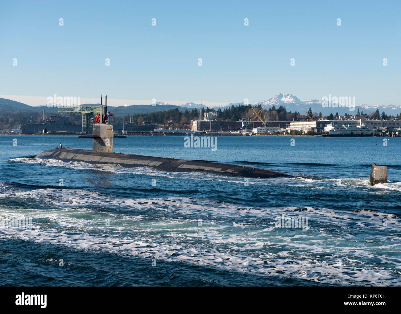 The U.S. Navy Los Angelesclass fastattack submarine USS Jacksonville transits the Puget Sound