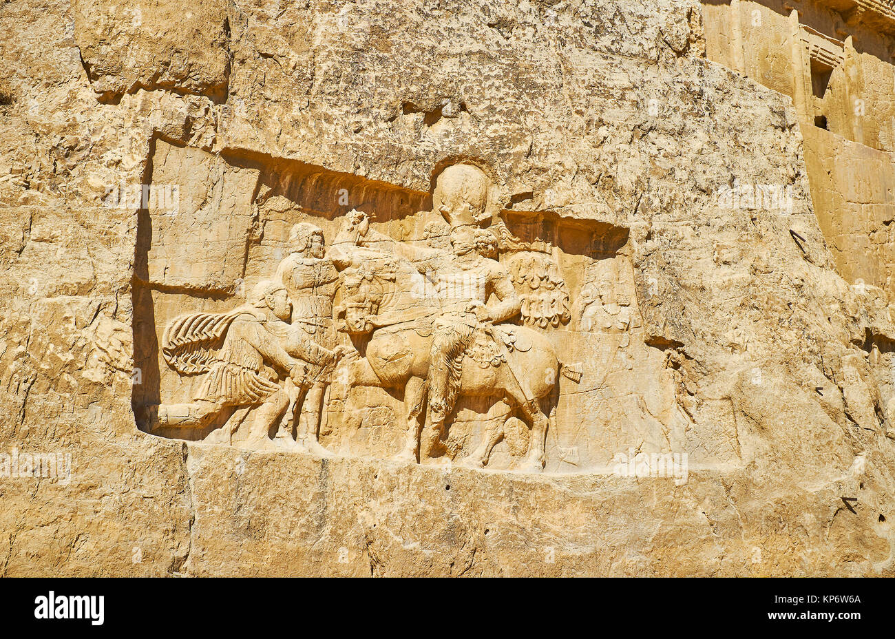 The ancient relief, depicting Triumph of Shapur I in Naqsh-e Rustam Necropolis, Iran. Stock Photo