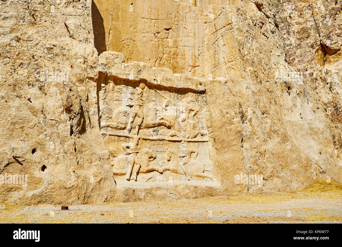 The panels with equestrian reliefs, carved in Hossein Mount, Naqsh-e Rustam Necropolis, Iran. Stock Photo