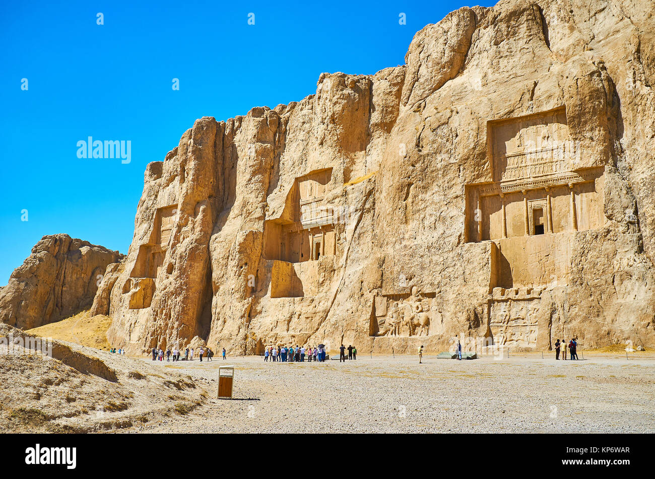 NAQSH-E RUSTAM, IRAN - OCTOBER 13, 2017: Naqsh-e Rustam Necropolis is the notable architectural ensemble of the ancent tombs, cut in rocky cliff, on O Stock Photo