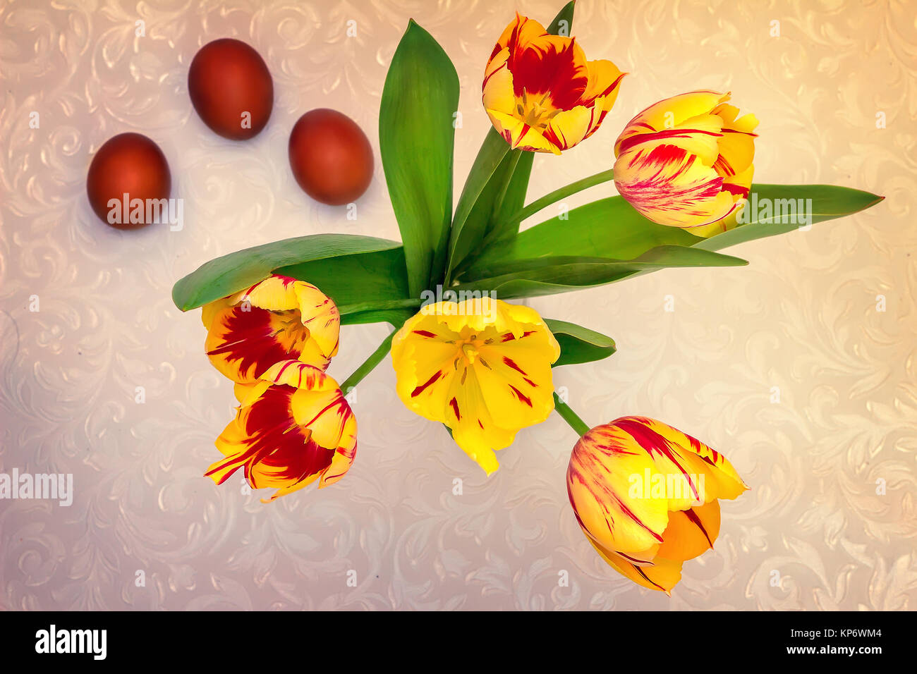 Bouquet yellow tulips and Easter eggs Stock Photo - Alamy