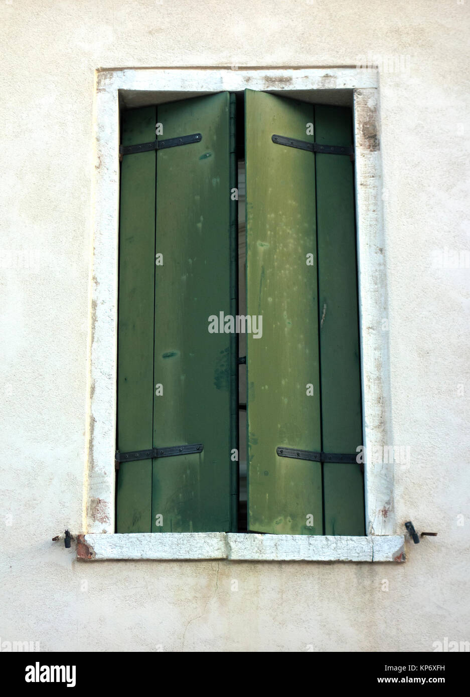 Green shutters in Venice, 2017. Stock Photo