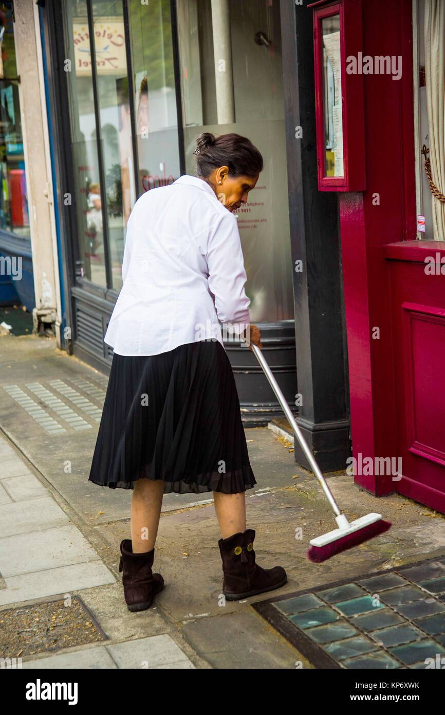 Sweeping Lady Stock Photos & Sweeping Lady Stock Images Alamy