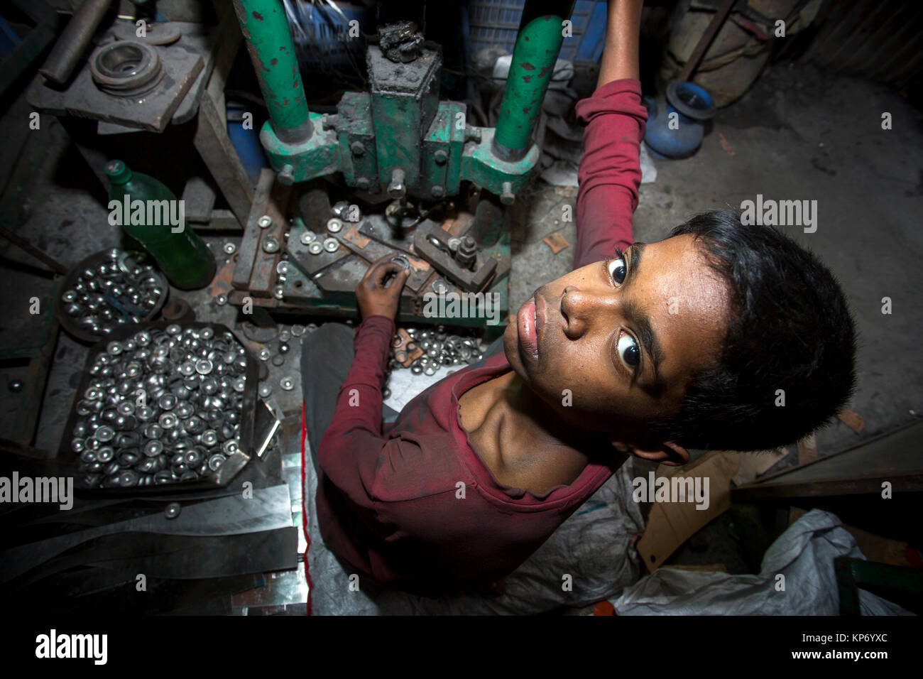 A child labors are working steel ball making factory Stock Photo - Alamy