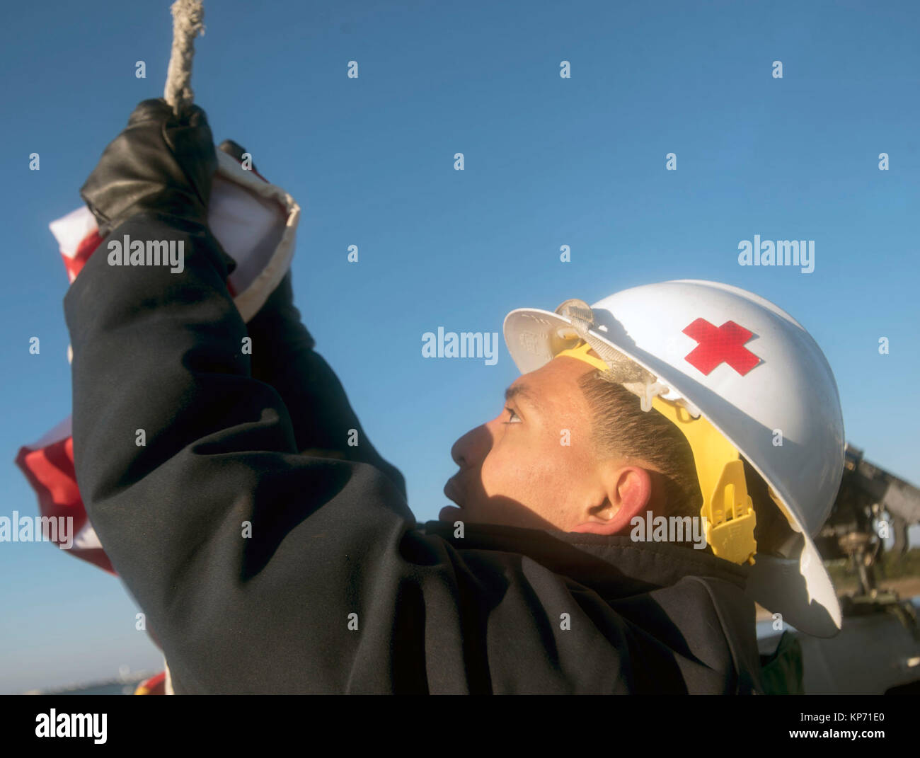 US navy medic wearing hard hat Stock Photo