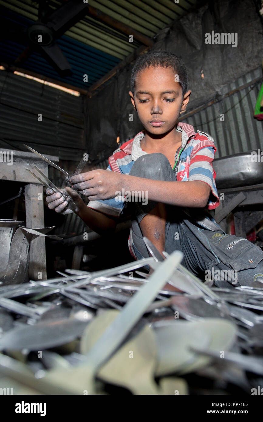 A child labor working Spoon-Making Factory near of Burigonga River at ...