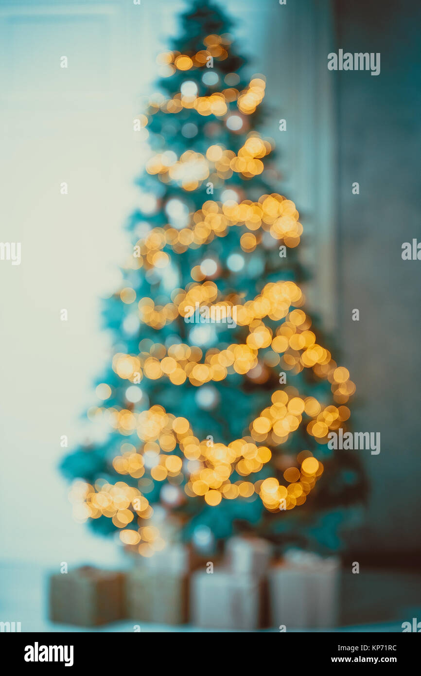 Holiday decorated room with Christmas tree out of focus shot for photo background Stock Photo