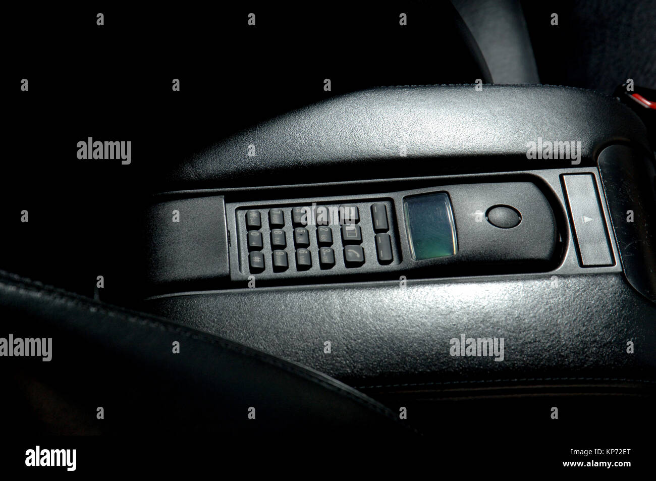 1990s or early 2000s car phone handset built into a BMW 7 Series German executive car Stock Photo
