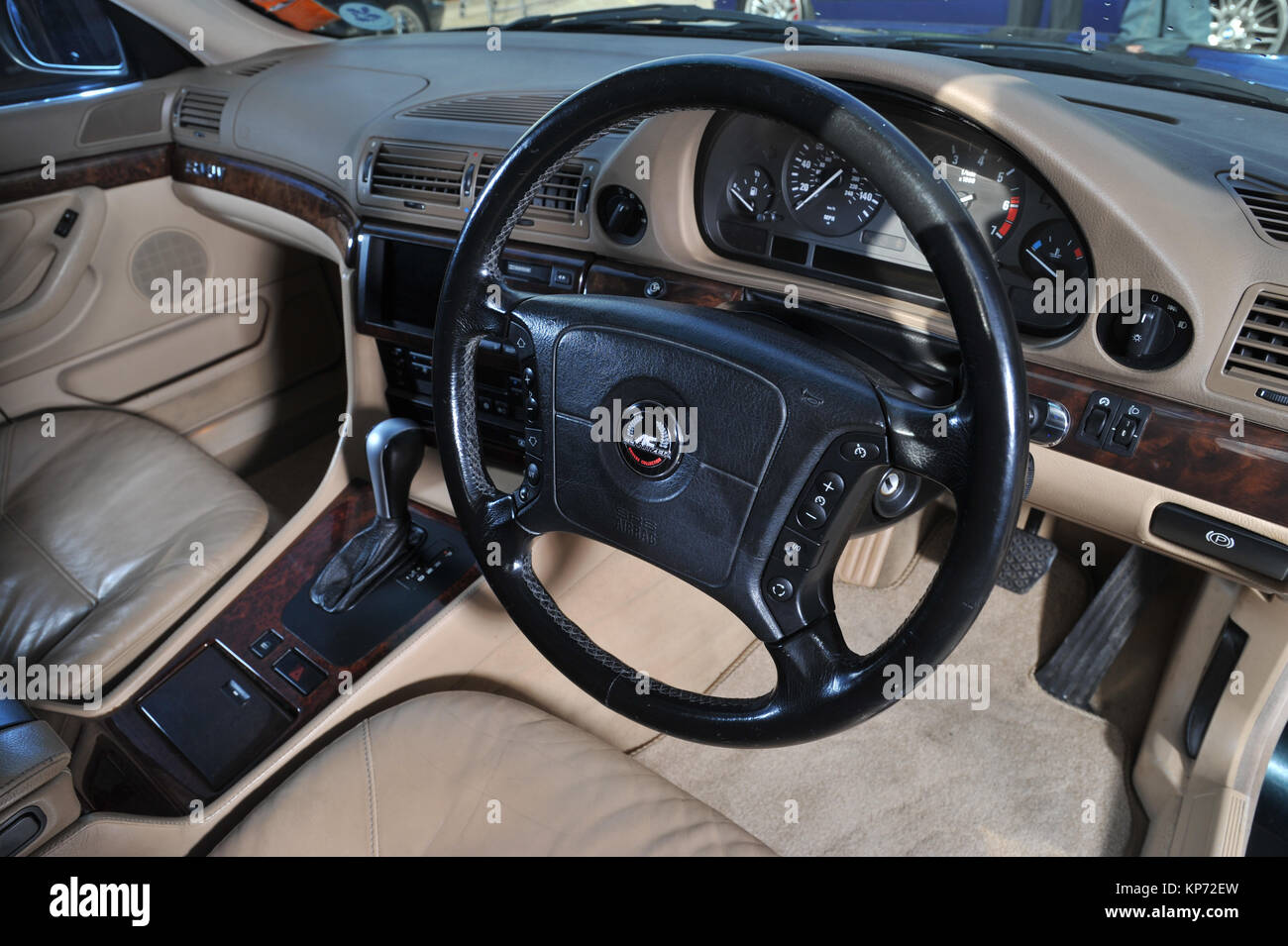 AC Schnitzer steering wheel in a 1990s BMW 7 Series car Stock Photo - Alamy