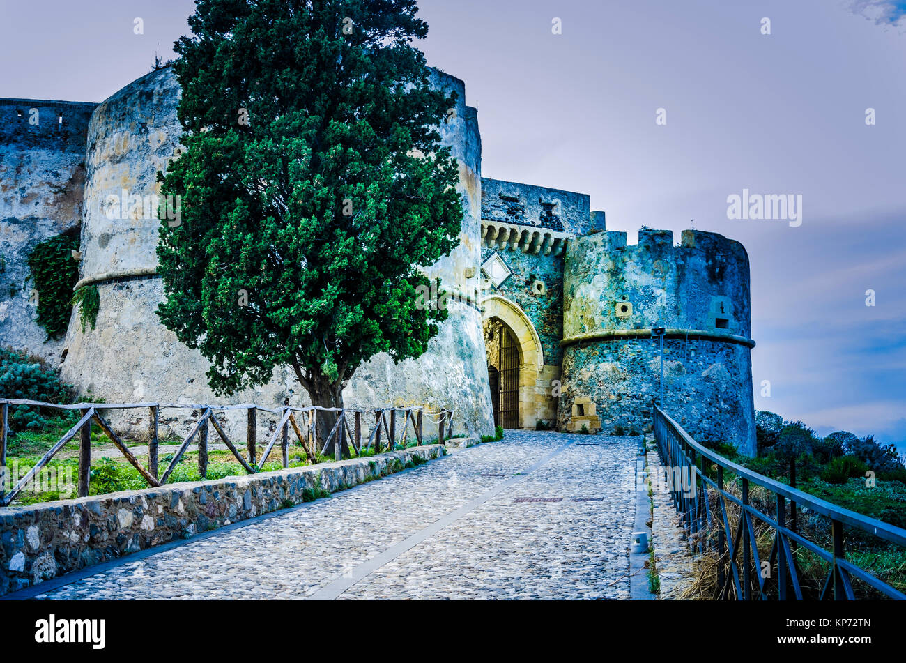 Ancient medieval street leading to Norman castle overlooking the city of milazzo sicily italy Stock Photo