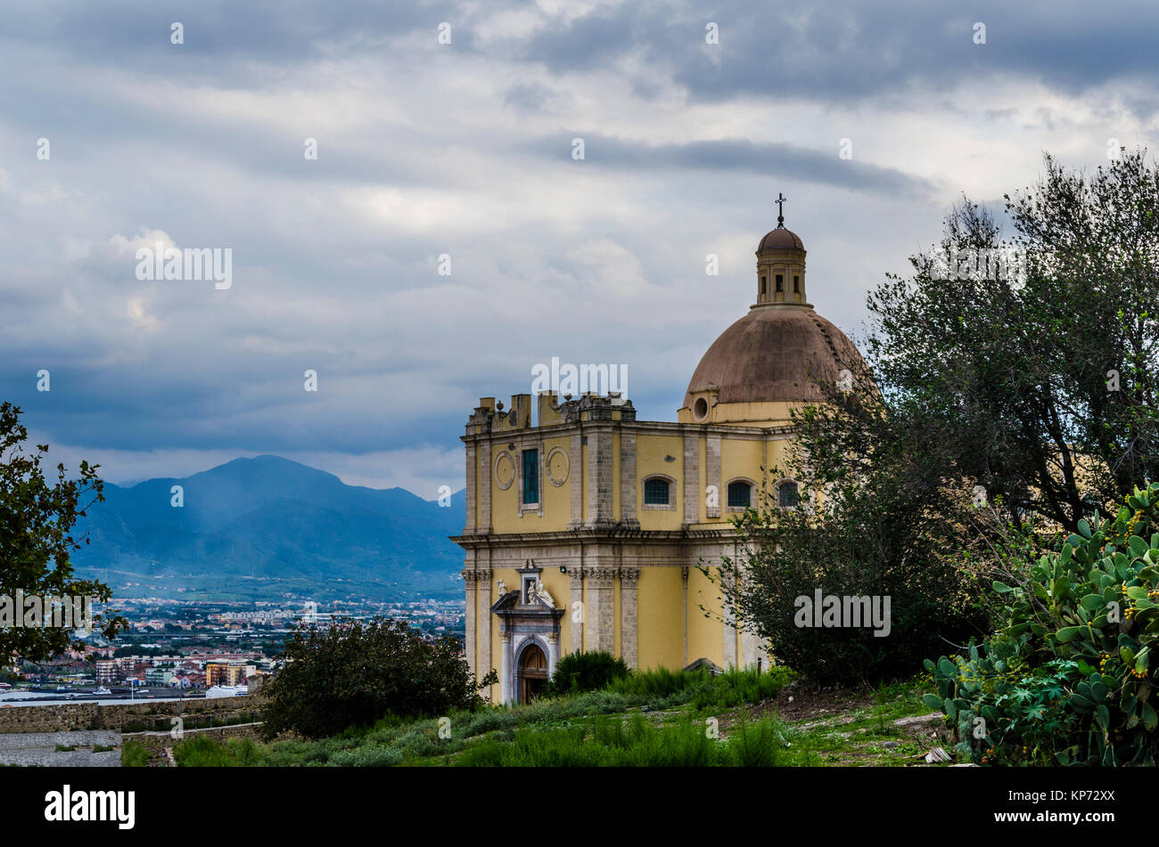 Baroque church the city of milazzo in the environs of its port and the landscape of the Sicilian territory with its mountains Stock Photo