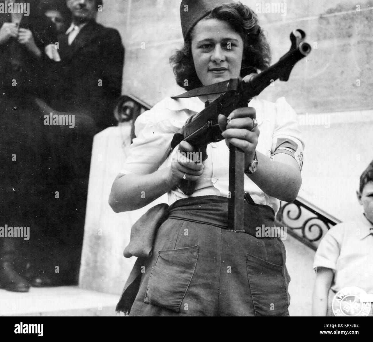 Aug 23, 1945 Nicole a French Partisan Who Captured 25 Nazis in the Chartres Area, in Addition to Liquidating Others, Poses with the Automatic Rifle Stock Photo