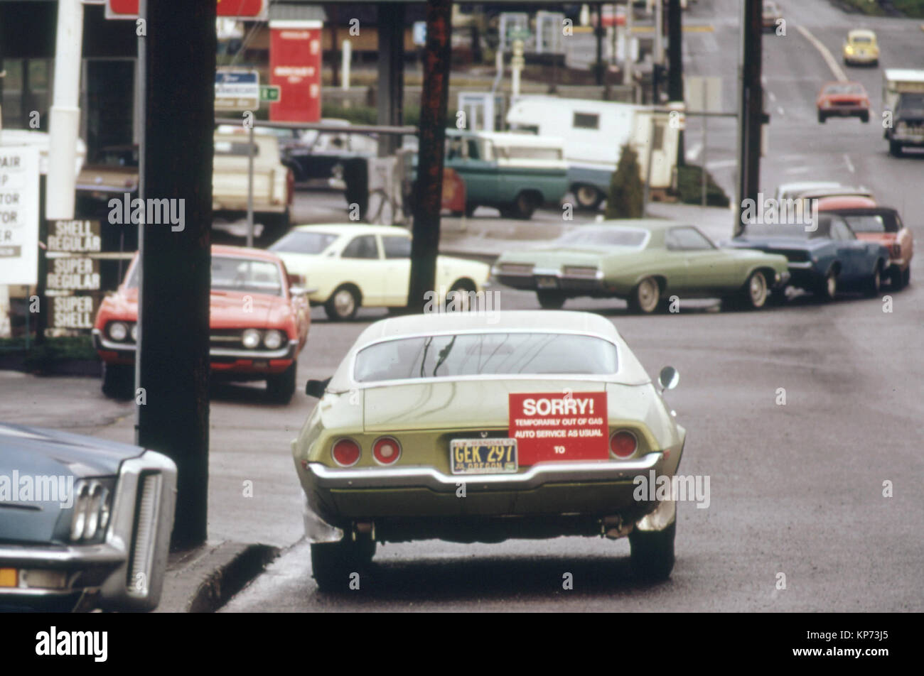 After Hours in a Gasoline Line a Driver Could Arrive at the Pumps and Find Out That the Car Ahead of Him Was the Last to Get Fuel. So Many Stations, Such as This One in Portland, Began Using a 'Sorry' Sign on the Last Car to Get Gas 12/1973 Stock Photo
