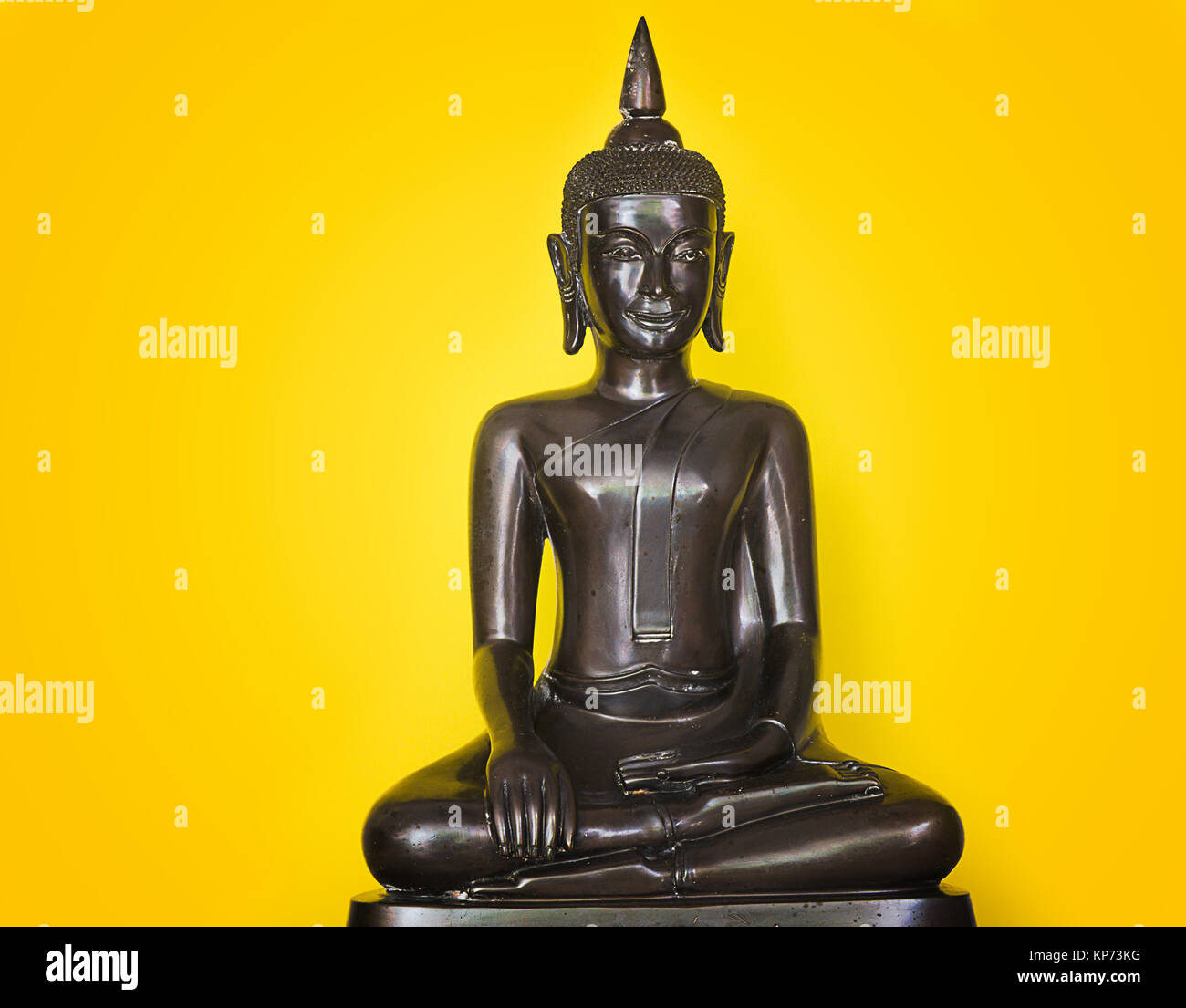 Black Buddha statue on yellow background Stock Photo - Alamy Black Buddha statue on yellow background Stock Photo - Alamy