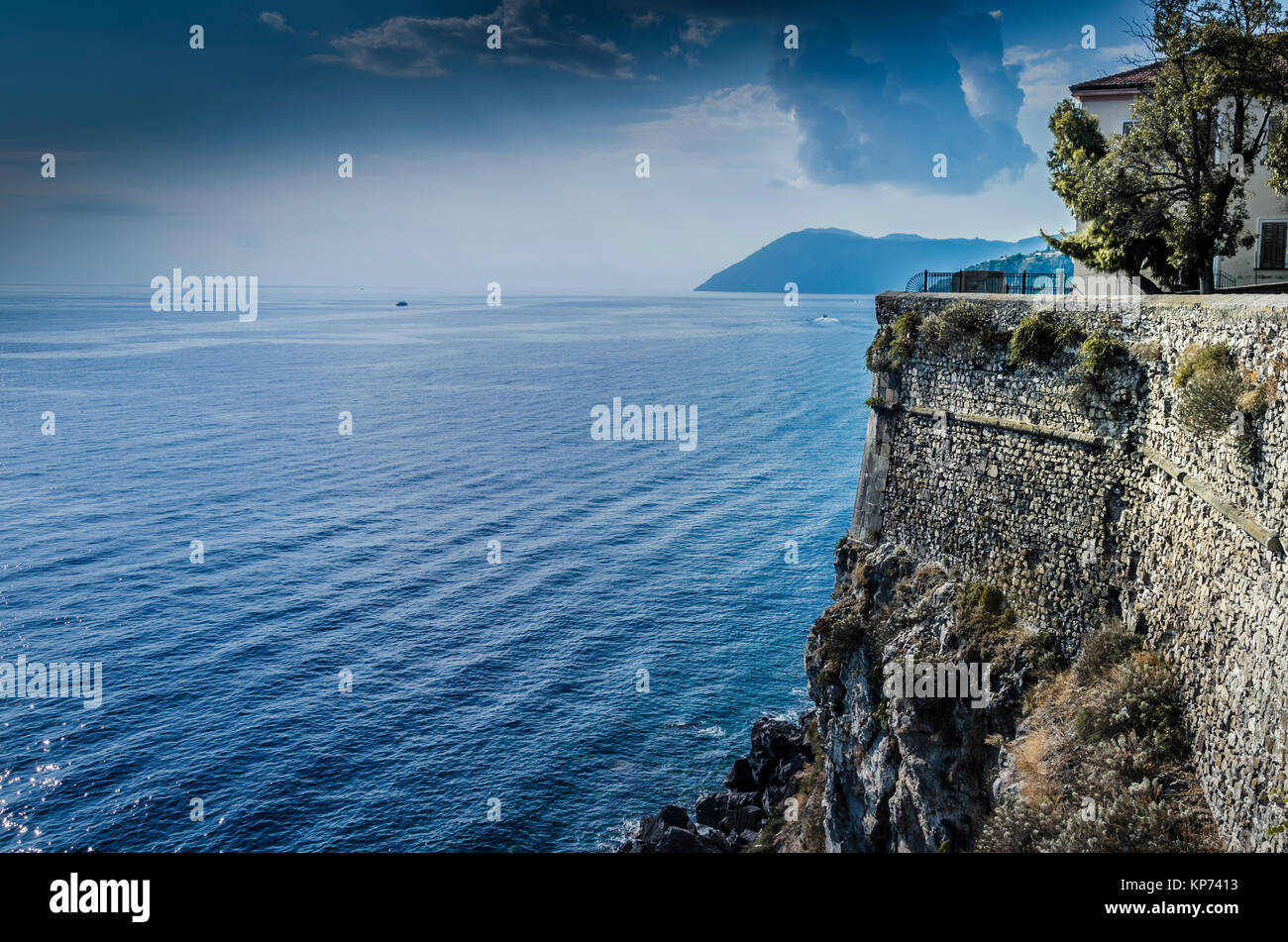 Walls of the coastal defensive fortress on Lipari Island and panoramic views of the Tyrrhenian Sea Stock Photo