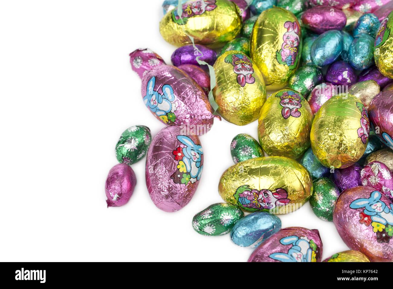 colorful chocolate eggs on a white background Stock Photo - Alamy