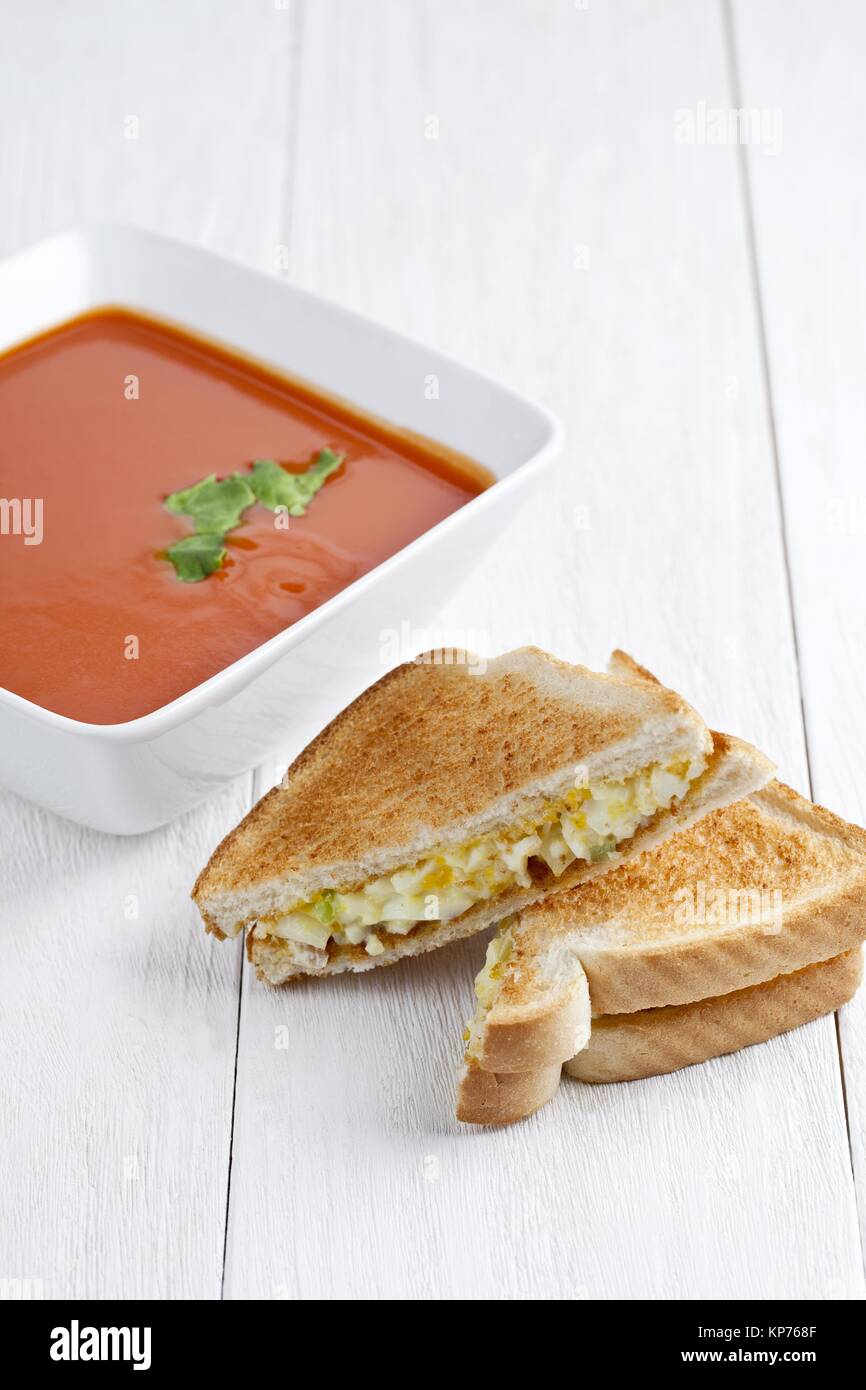creamy tomato soup and sandwich Stock Photo Alamy