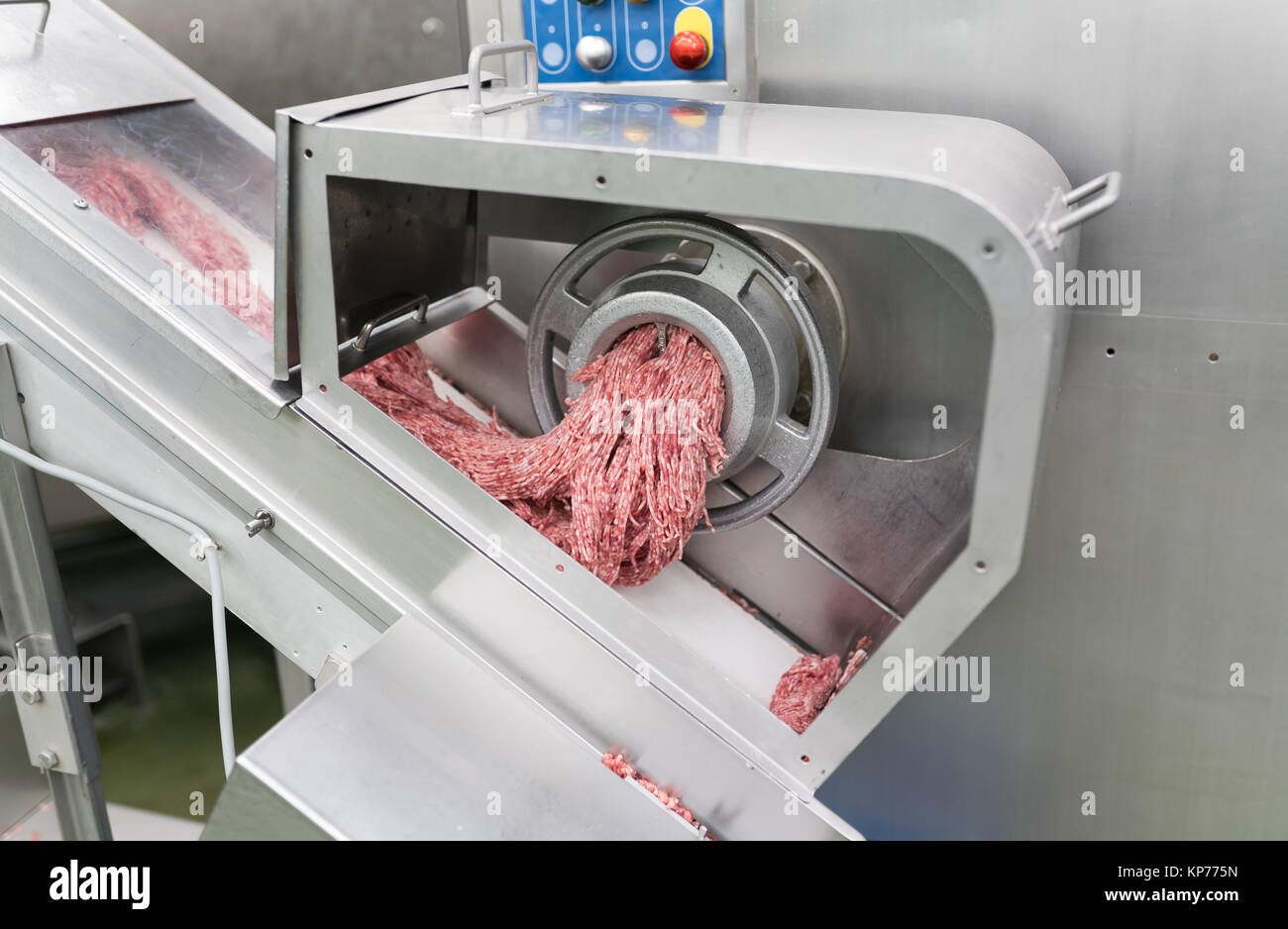 https://c8.alamy.com/comp/KP775N/ground-beef-and-pork-being-ground-in-a-factory-KP775N.jpg